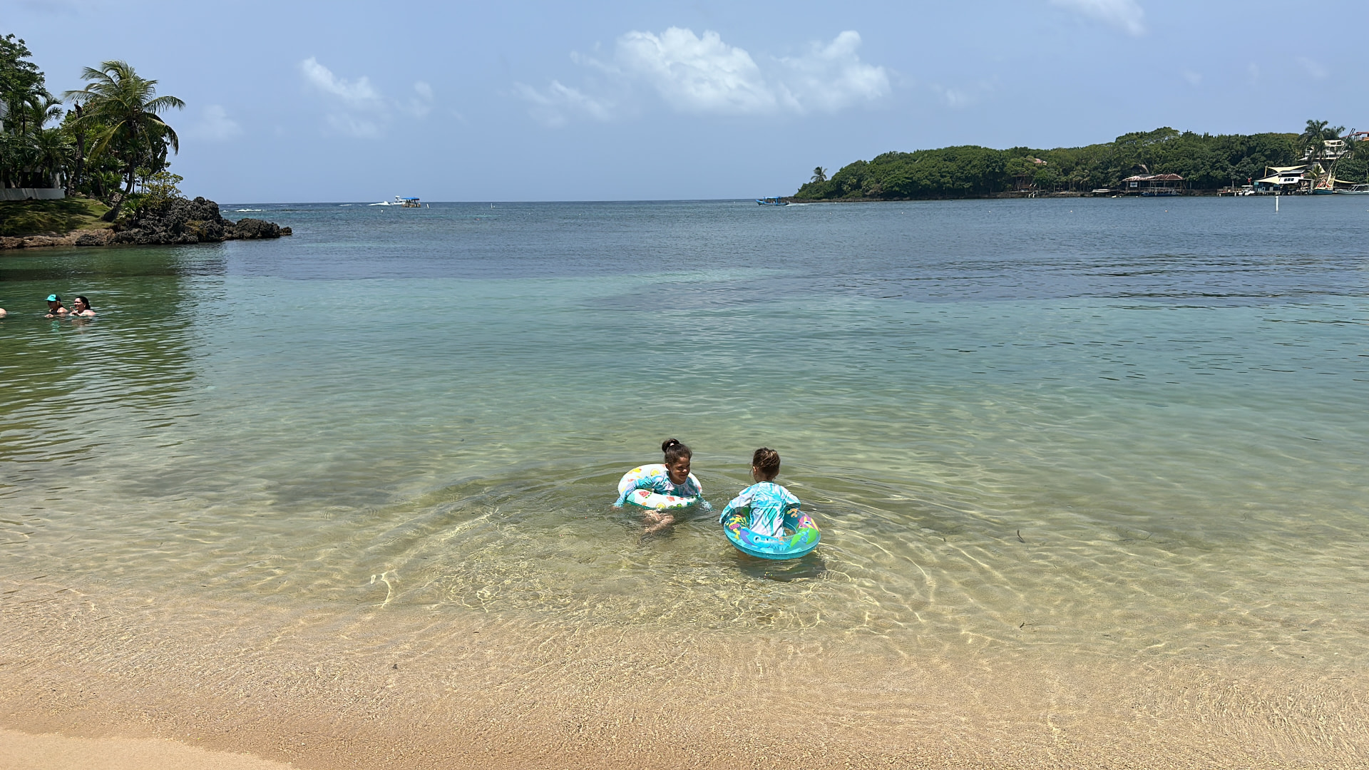 Children enjoying the shallow Caribbean water